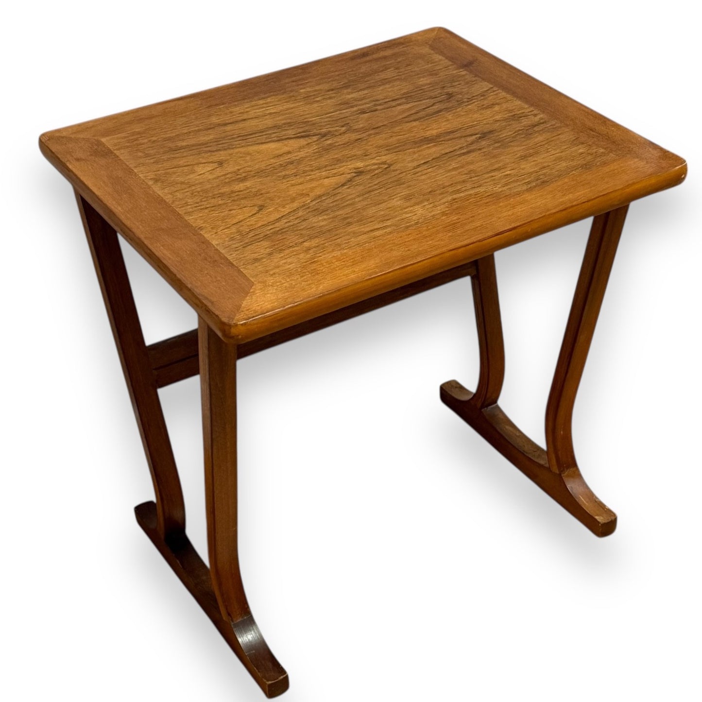 Mid-century teak coffee or side table by Parker Knoll with rectangular top, rounded edges, and splayed legs joined by a stretcher bar – elegant vintage design by Avego Antiques.