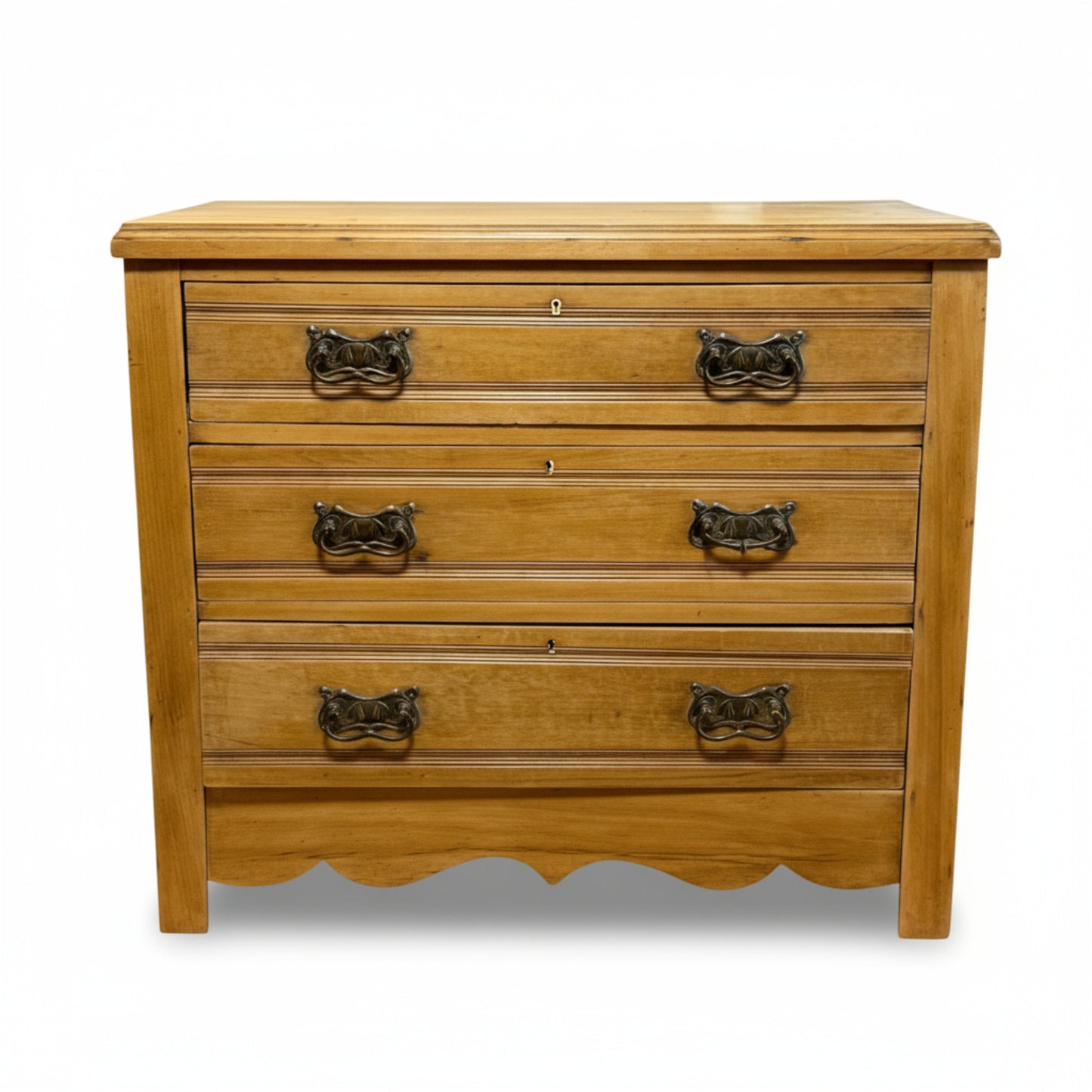 Front view of Edwardian pine chest of drawers