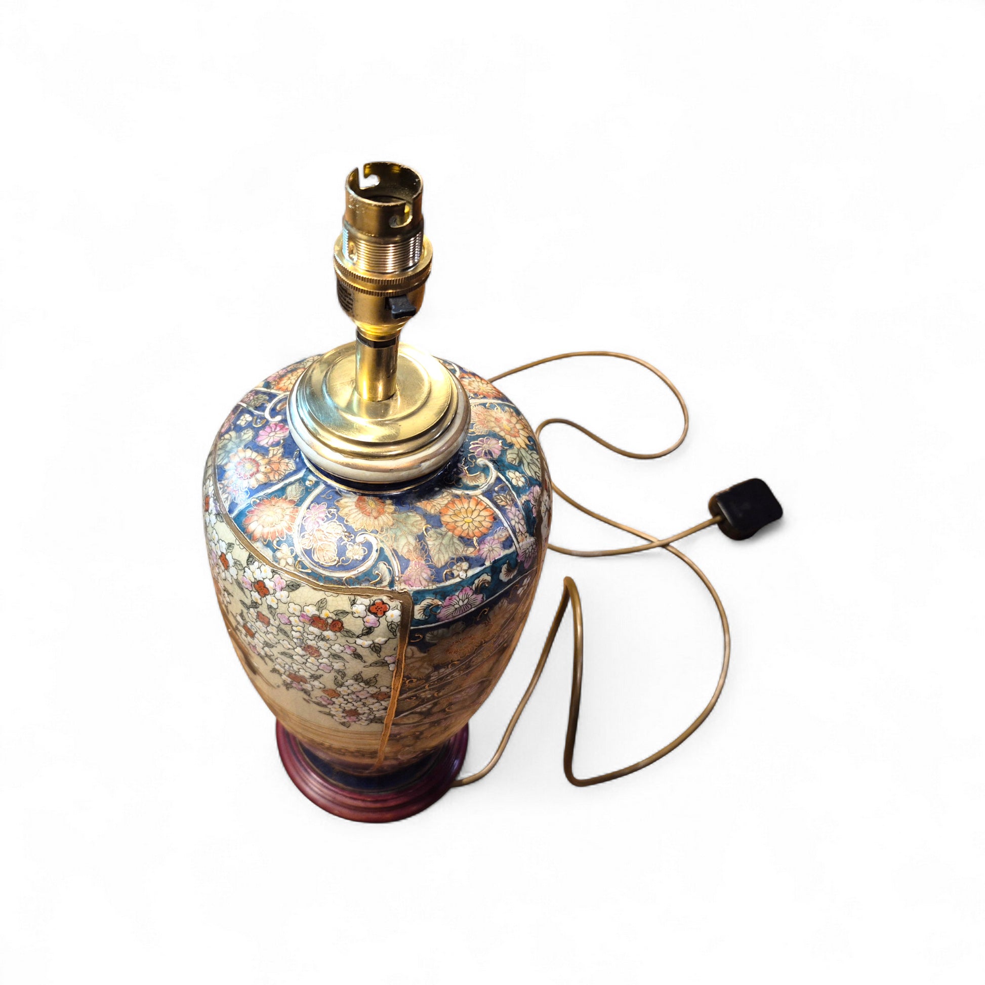 Hand-painted Japanese Geisha lamp displayed on wooden table