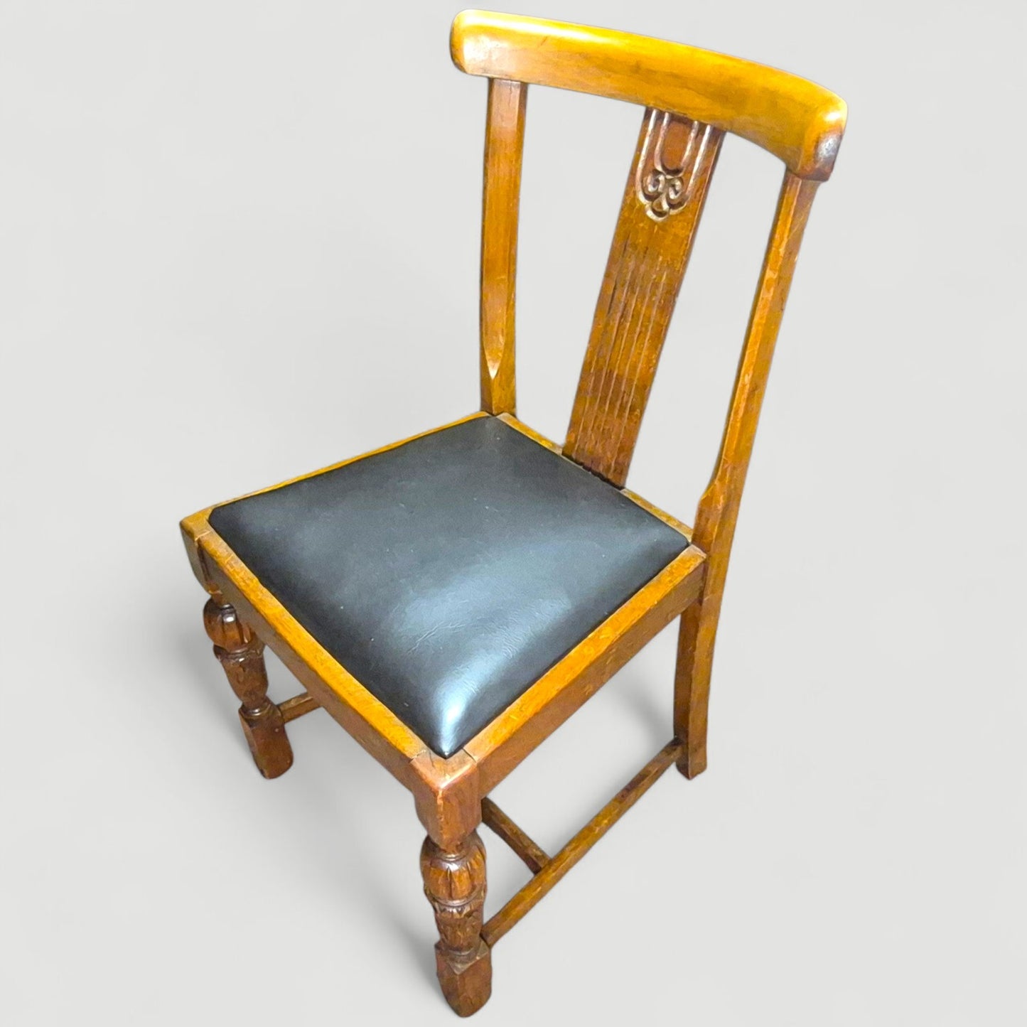 Set of 4 Vintage 1920s Honey Oak Dining Chairs – Carved Detail & Black Upholstered Seats