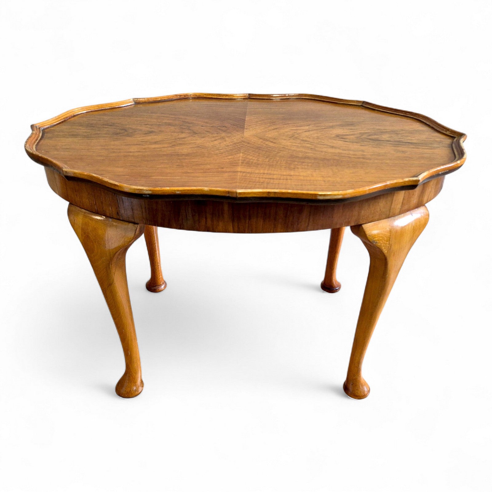 1930s vintage burr walnut coffee table with scalloped top and elegant cabriole legs
