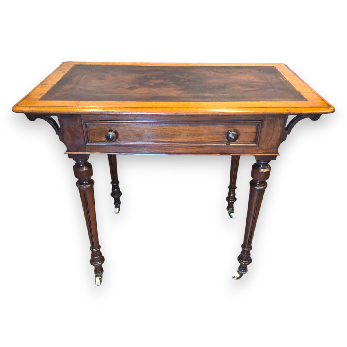 Victorian walnut writing table with aged leather inset top, c.1860–1880