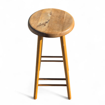 Vintage mid-century beech and elm kitchen stool with round elm seat and tapered legs – retro seating full of charm, ideal for rustic or modern interiors by Avego Antiques.