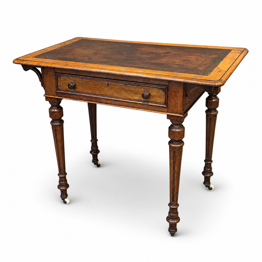Antique Victorian walnut writing table with aged leather inset top, c.1860–1880