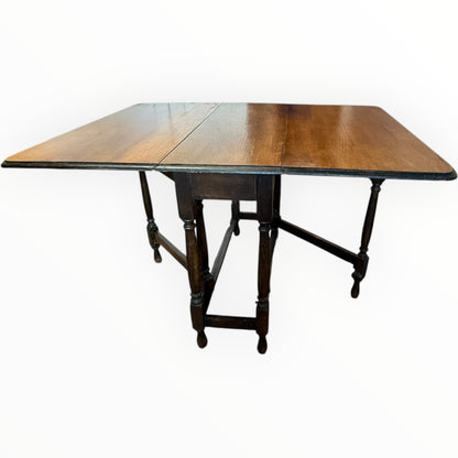 Early 20th Century Oak Drop Leaf Table | Antique Folding Oak Dining Table