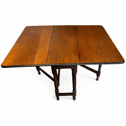 Early 20th Century Oak Drop Leaf Table | Antique Folding Oak Dining Table