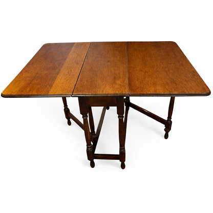 Early 20th Century Oak Drop Leaf Table | Antique Folding Oak Dining Table