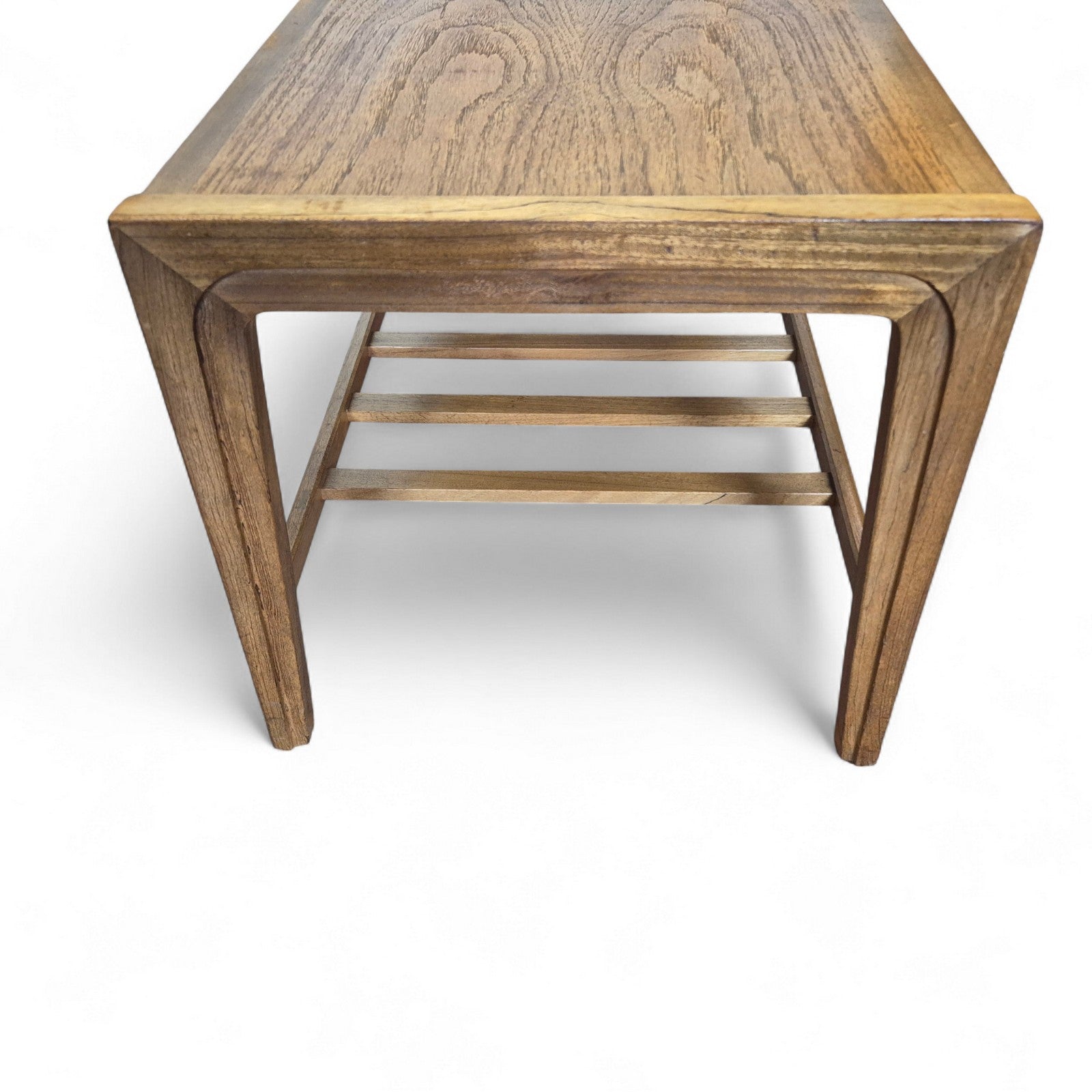 Detail of the Remploy teak coffee table’s tapered legs and slatted lower shelf — fine British craftsmanship inspired by Swedish design.