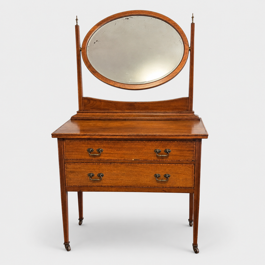 Antique Edwardian mahogany veneer dressing table with oval bevelled mirror and two drawers