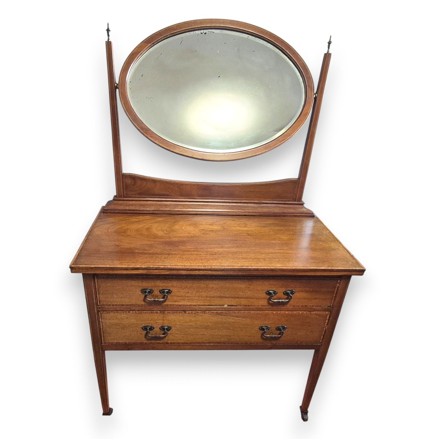 Antique bedroom vanity with mahogany veneer, raised swing mirror and tapered legs