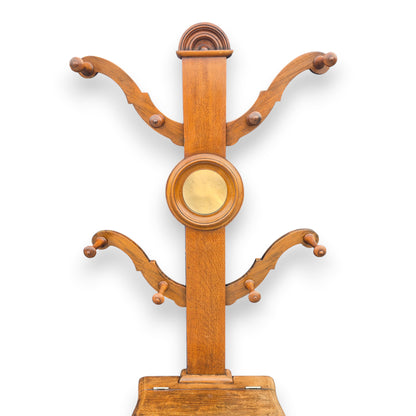 Turned wooden coat and hat hooks on antique Edwardian Arts and Crafts hall stand