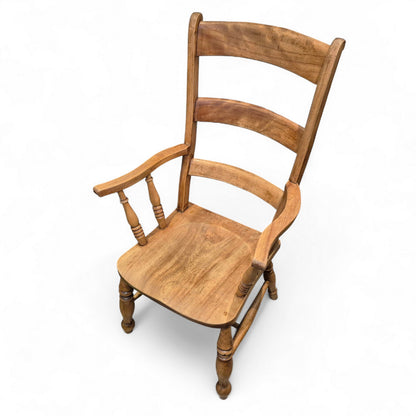 Angled view of elm farmhouse ladder back armchair