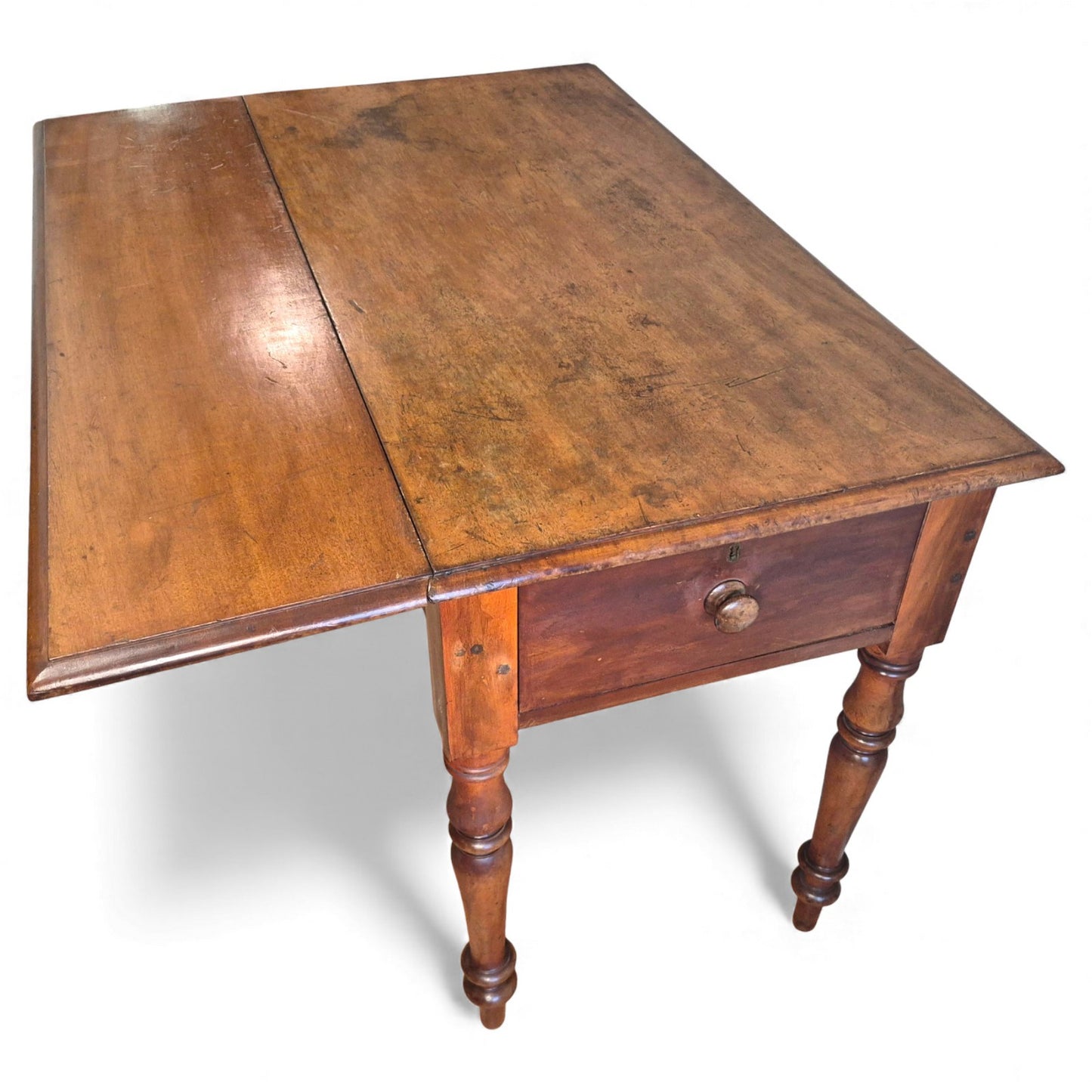 Detail of aged mahogany top showing rich patina and wear