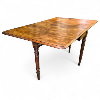 Antique drop-leaf table with turned legs
