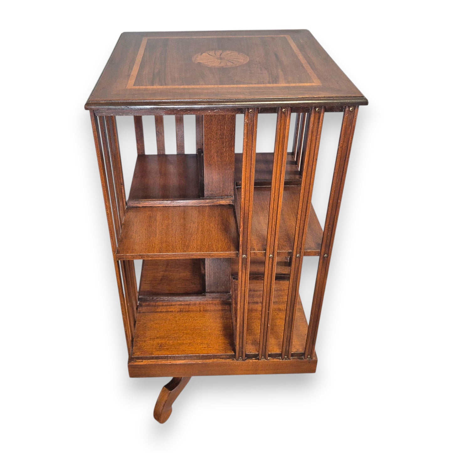 Edwardian mahogany revolving bookcase with open book storage