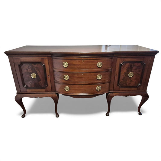 Antique mahogany serpentine-front sideboard with cabriole legs