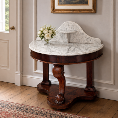 Antique mahogany hall console table with a semi-circular marble top and ornate carved support.