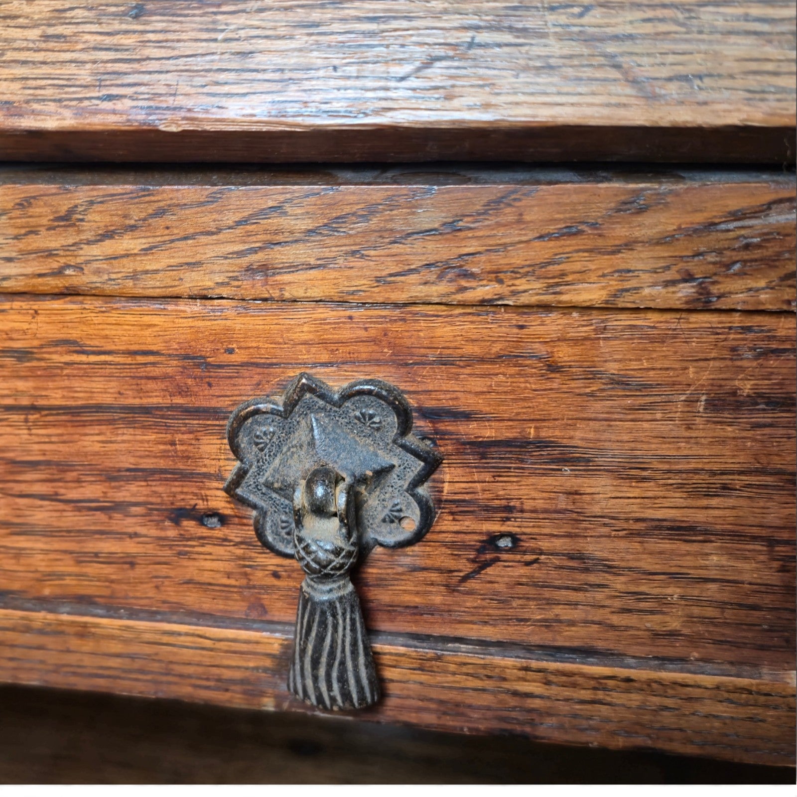 Antique oak writing desk – close-up of handle craftsmanship and detailing