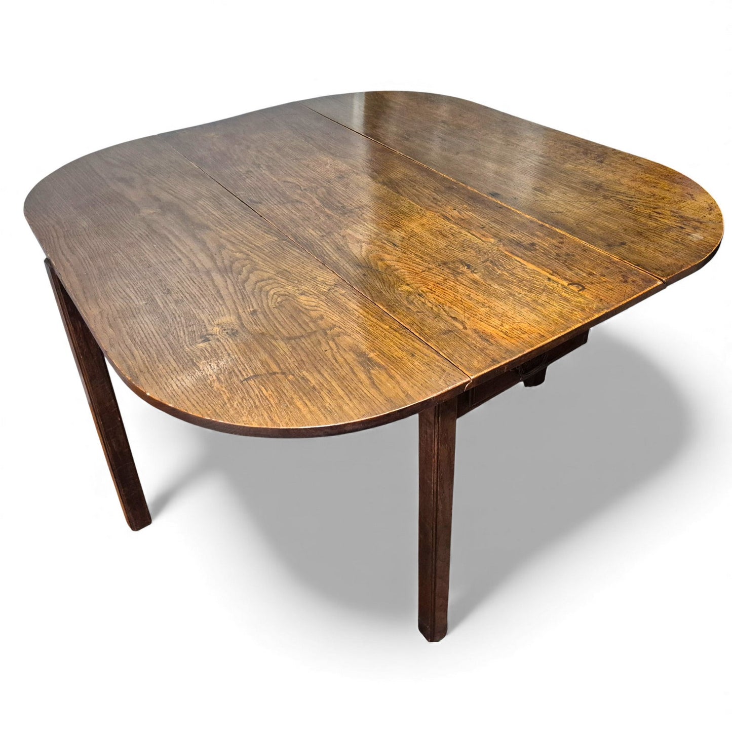 Oak drop-leaf table shown open with full dining surface