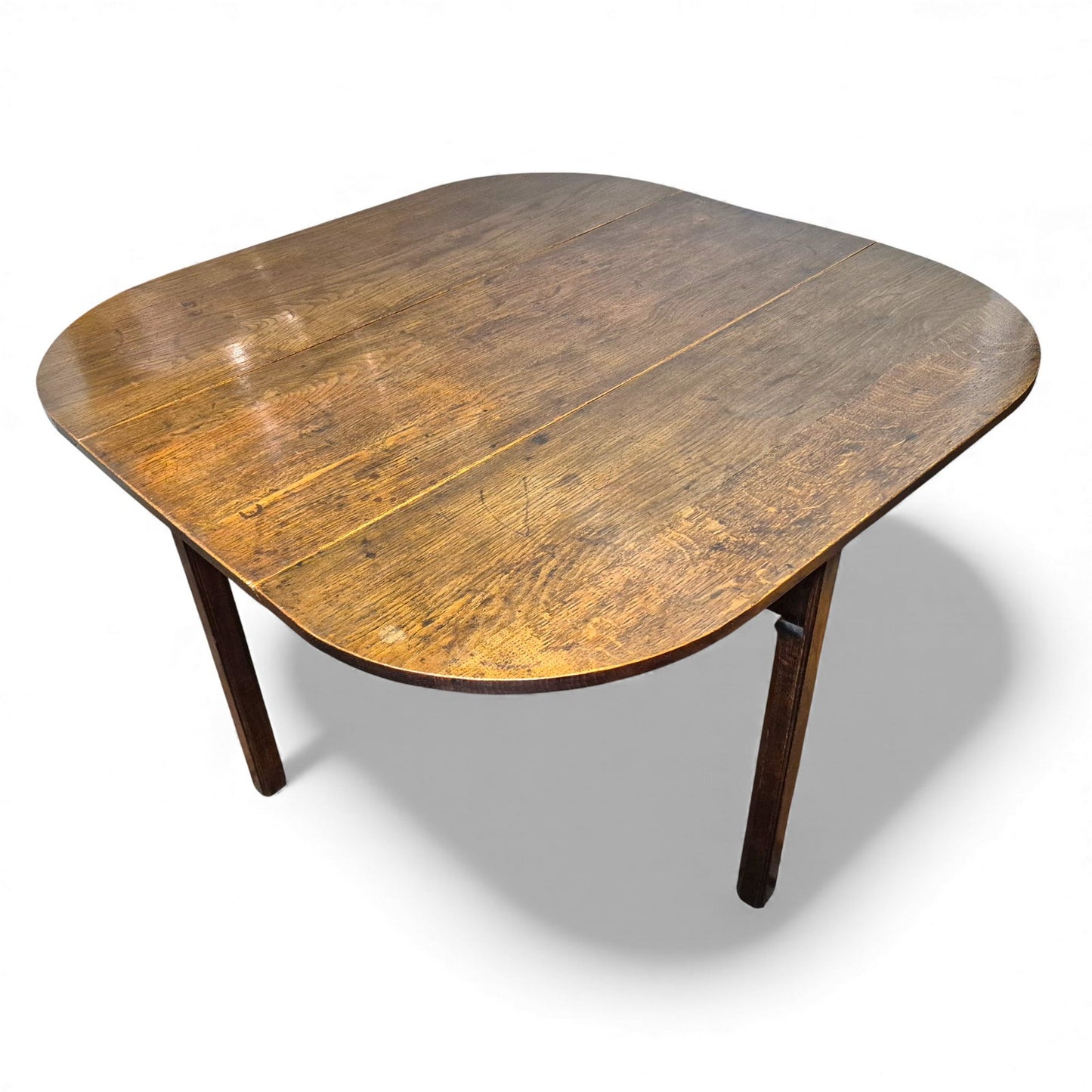 Antique oak drop-leaf kitchen table with plank top and rustic patina