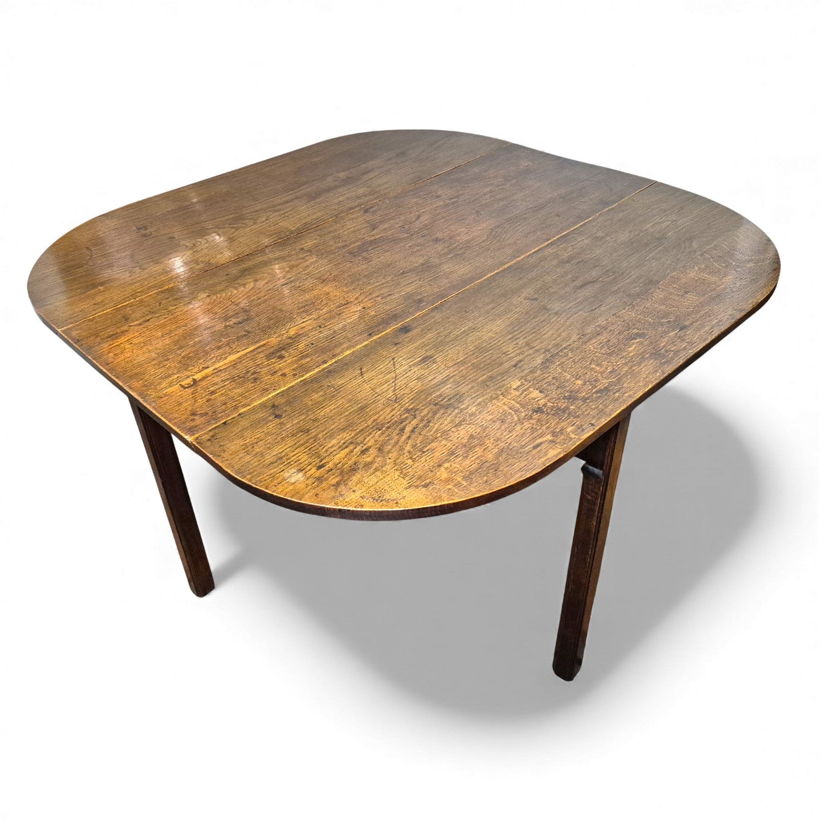 Antique oak drop-leaf kitchen table with plank top and rustic patina