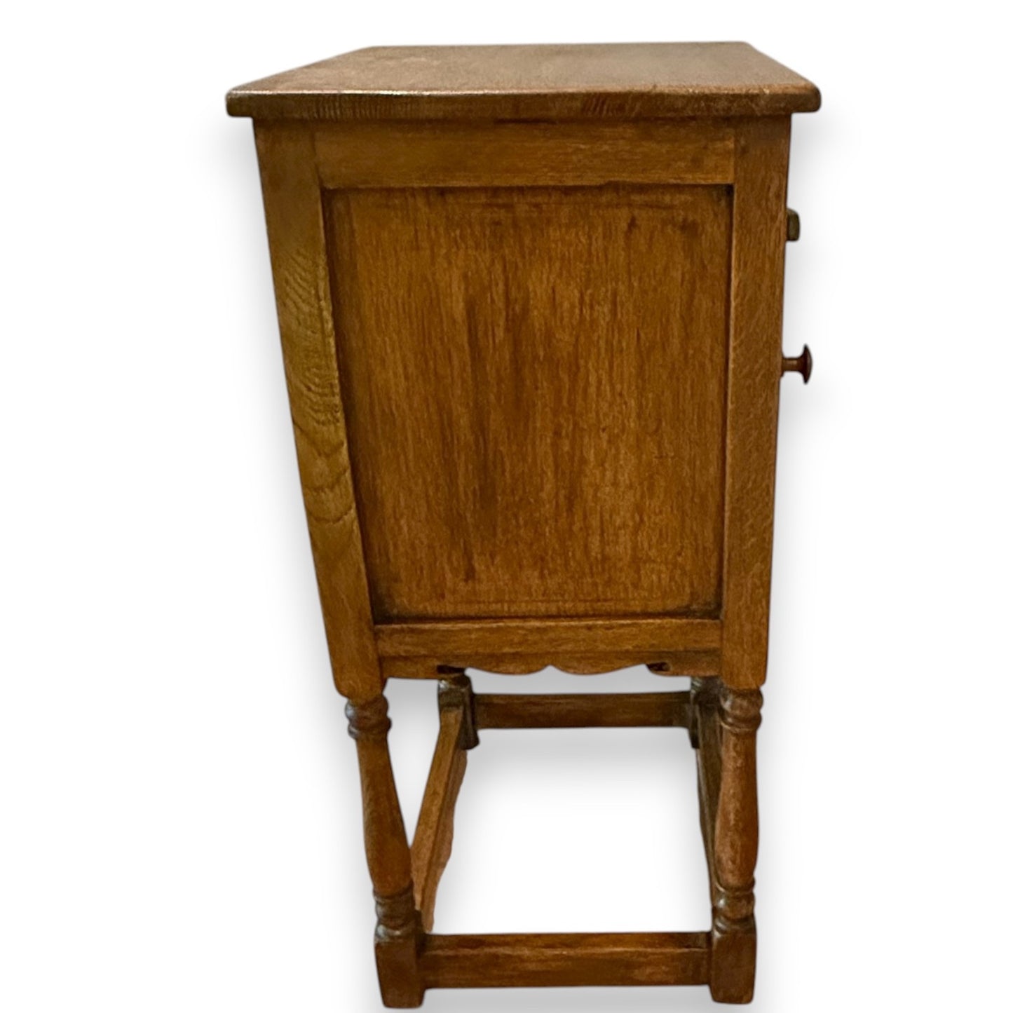 Antique oak cupboard – side profile showing depth and stretcher supports