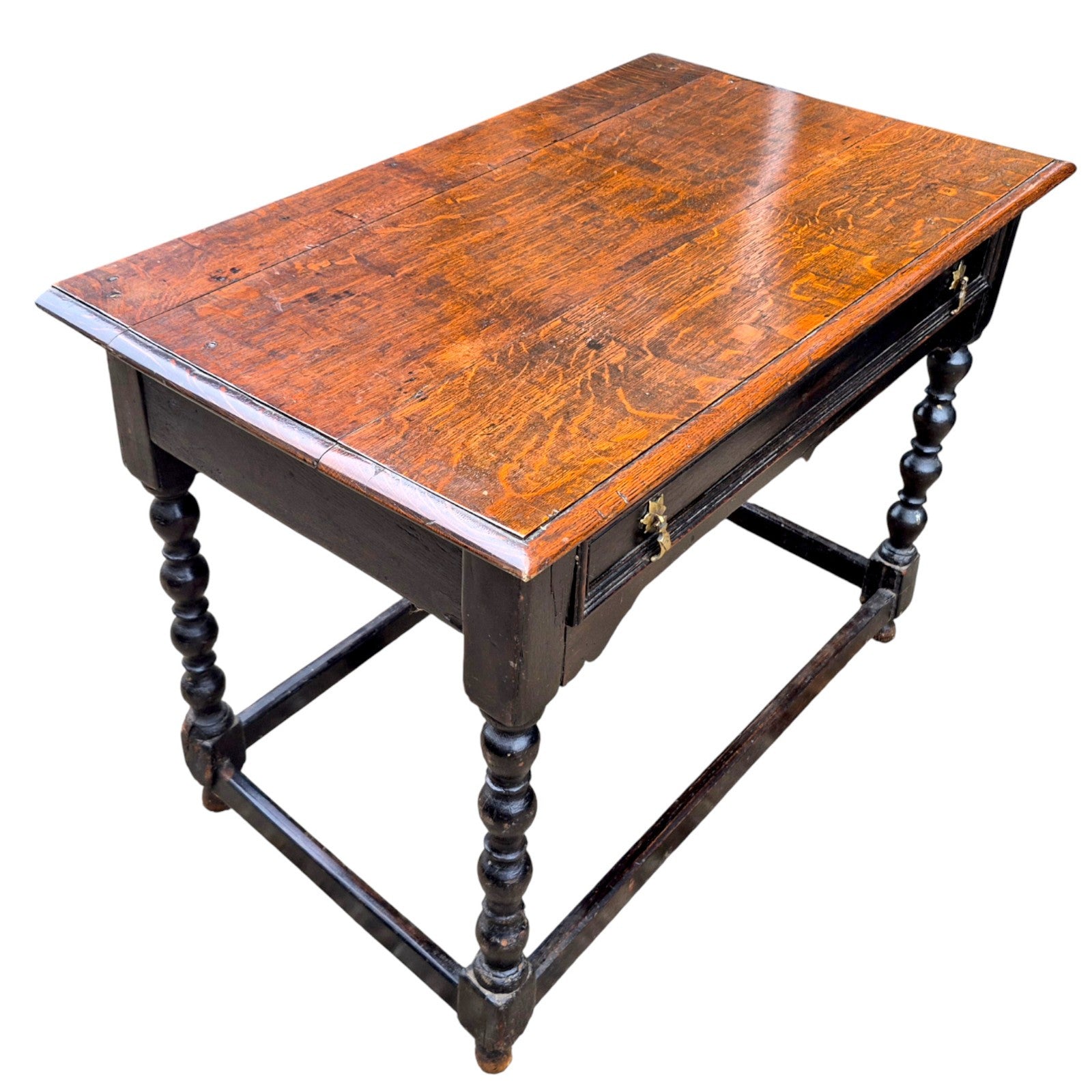 Antique oak side table showing rich patina, turned legs, and sturdy stretcher base — classic English craftsmanship.
