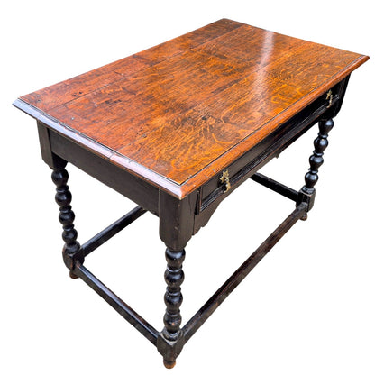 Antique oak side table showing rich patina, turned legs, and sturdy stretcher base — classic English craftsmanship.