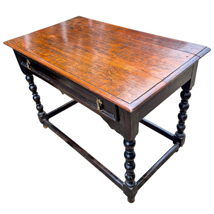 Antique oak side table with sturdy stretcher base — classic English craftsmanship.