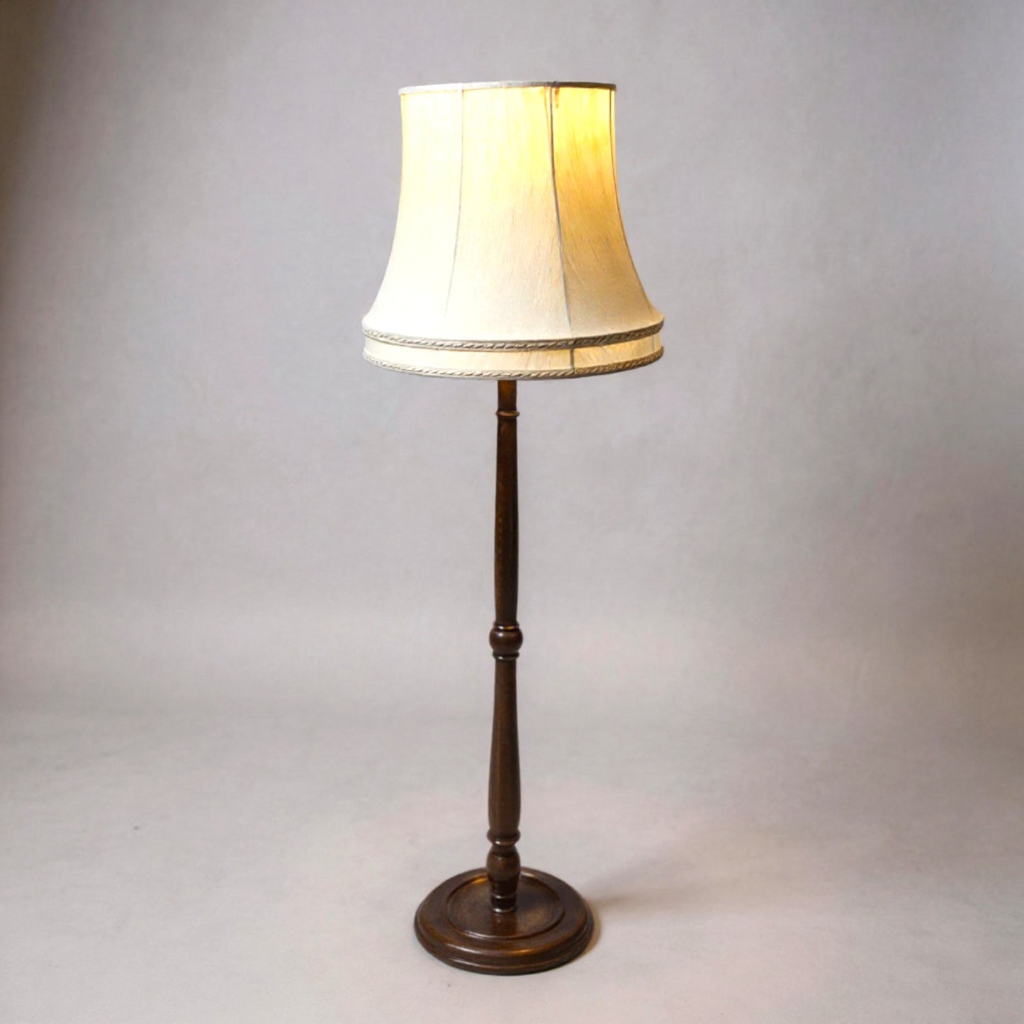 Antique oak standard lamp with turned column and fabric shade