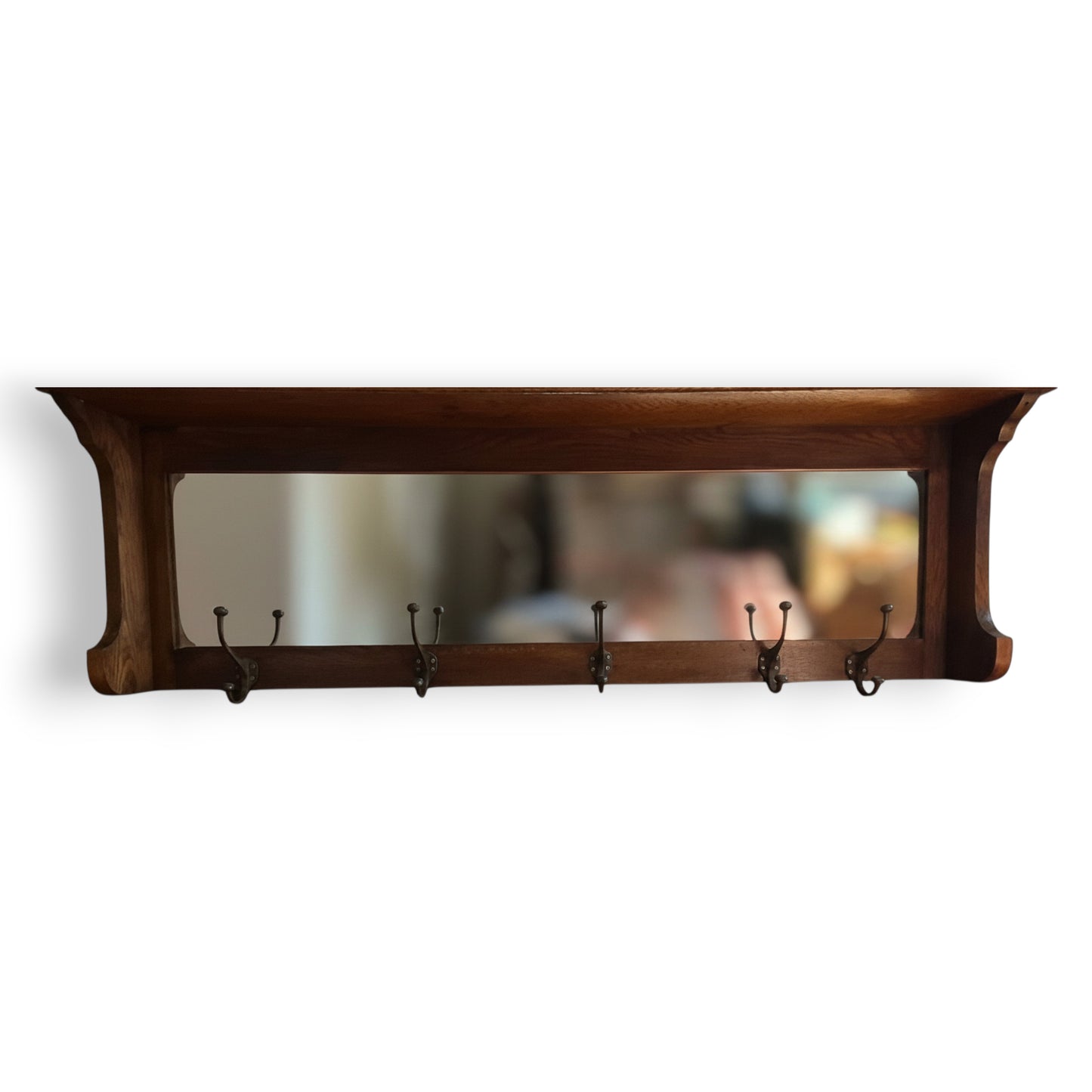 Front view of antique oak hall rack with mirror and coat hooks
