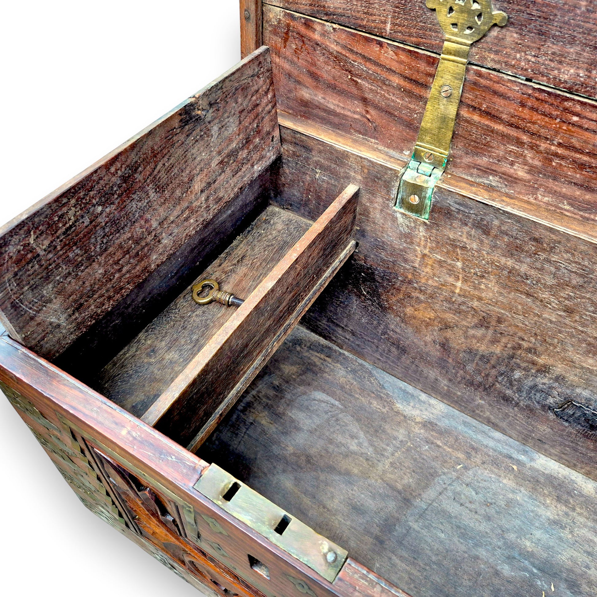 Internal compartment inside antique padouk storage chest