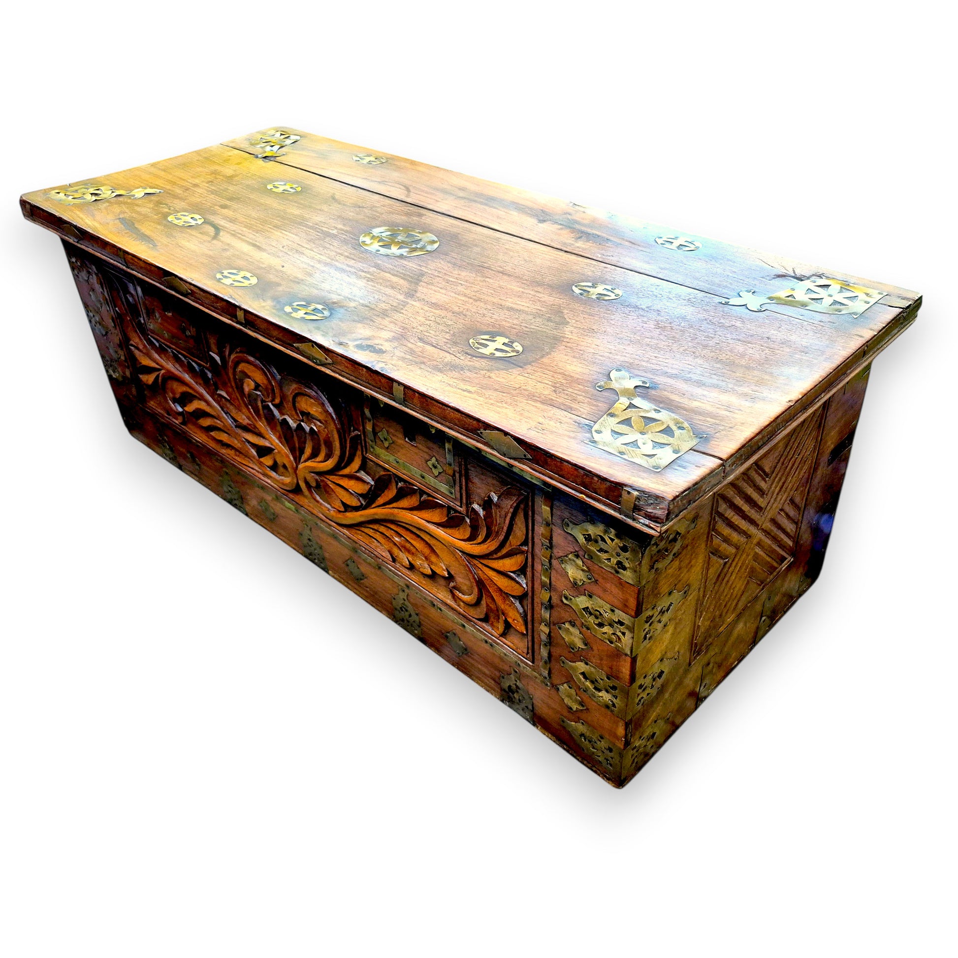 Three-quarter view of antique padouk storage chest / blanket box with brass fittings