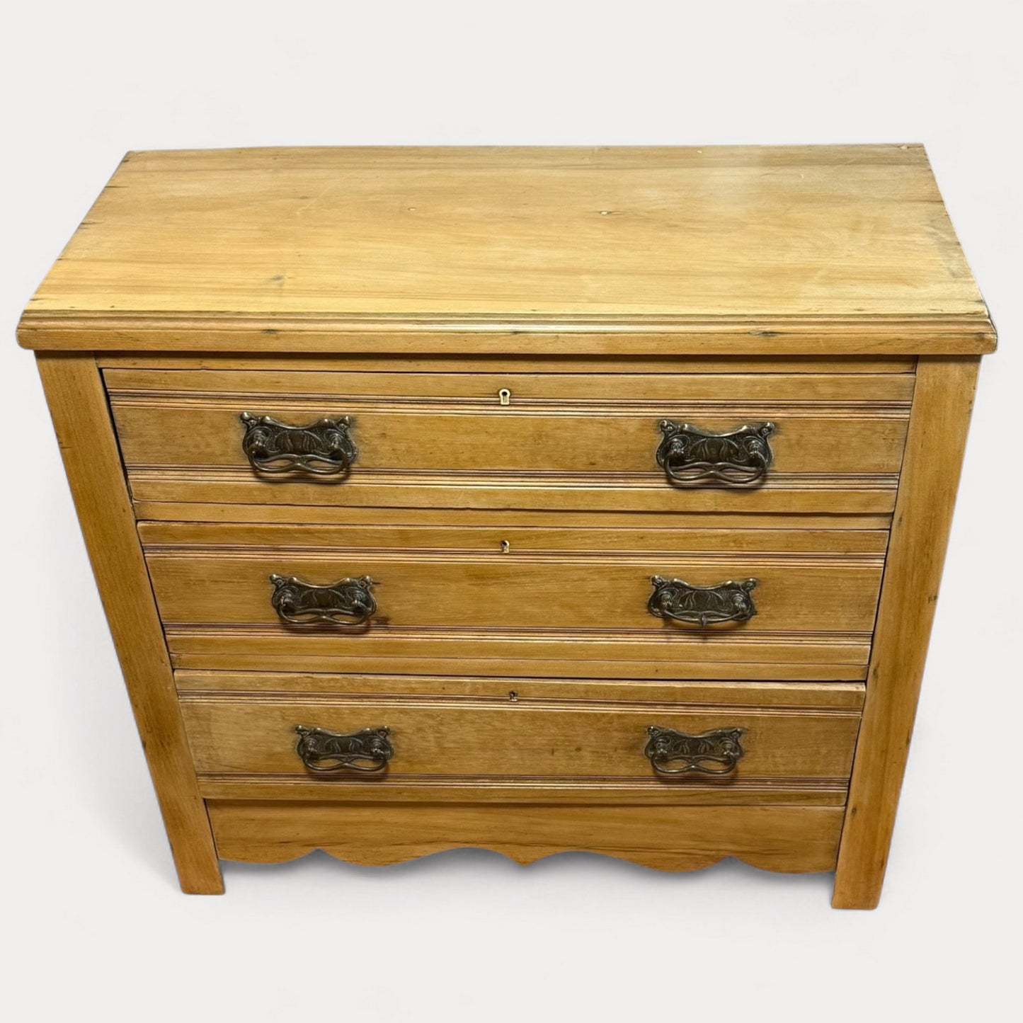 Top view of Edwardian pine chest of drawers 