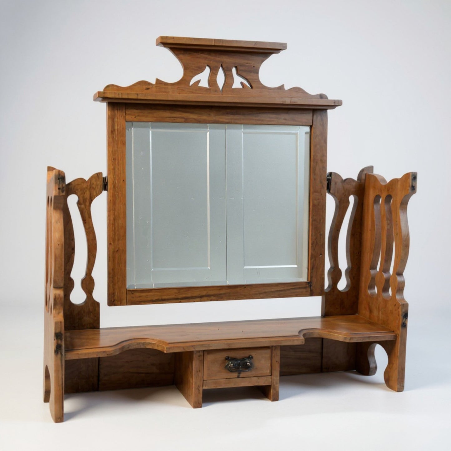 Rustic pine mirror – angled view highlighting warm patina and carved details