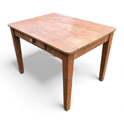 Solid pine table with plank top and tapered farmhouse legs