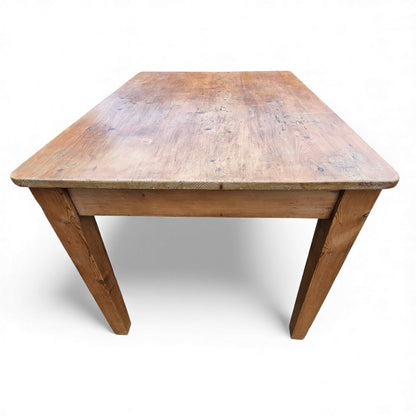 Rustic pine table showing natural grain and colour variation