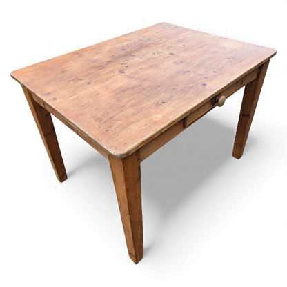 Pine farmhouse table used as kitchen or breakfast table