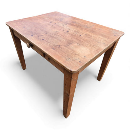 Antique pine table showing drawer and leg detail