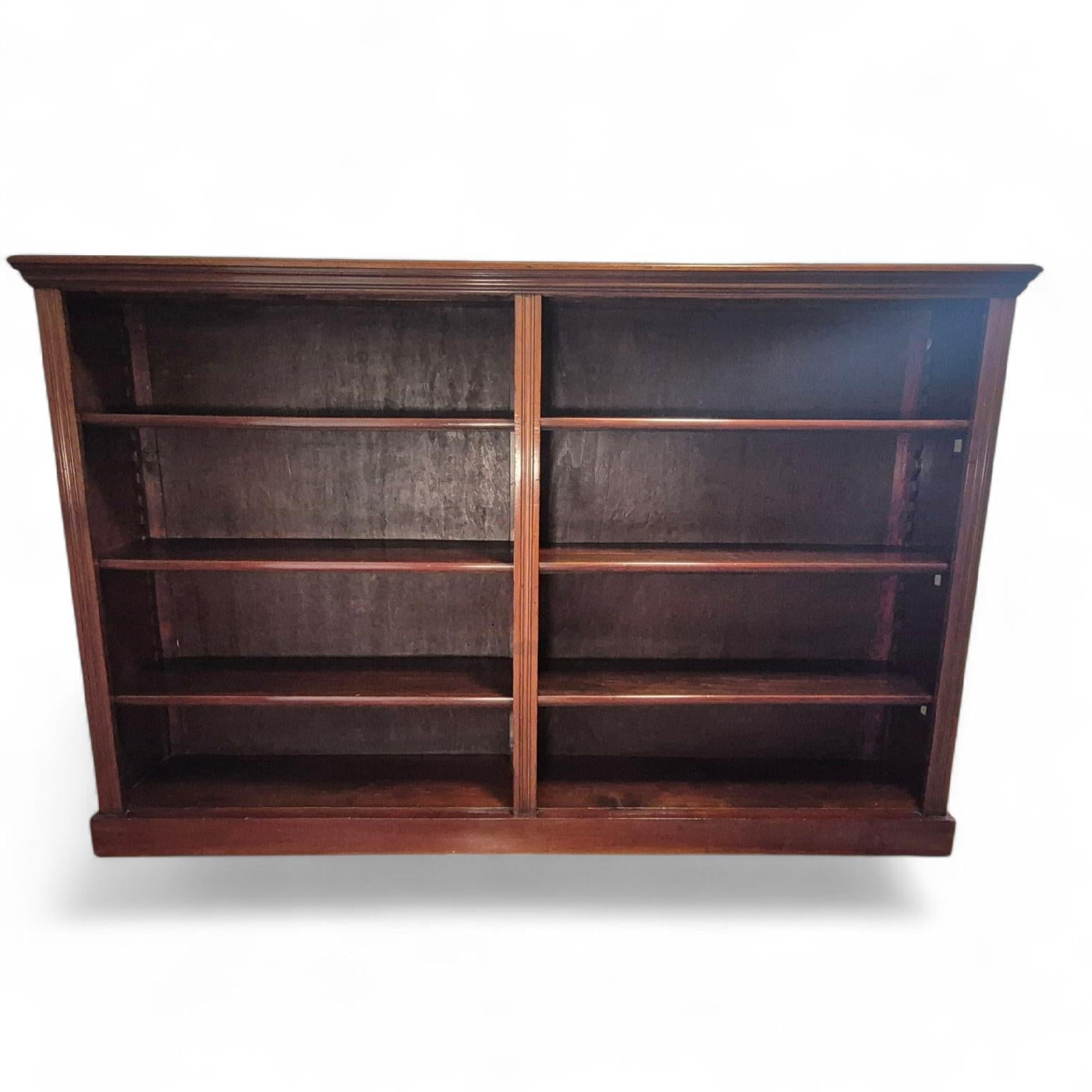 Front view of antique Victorian mahogany open bookcase with adjustable shelves