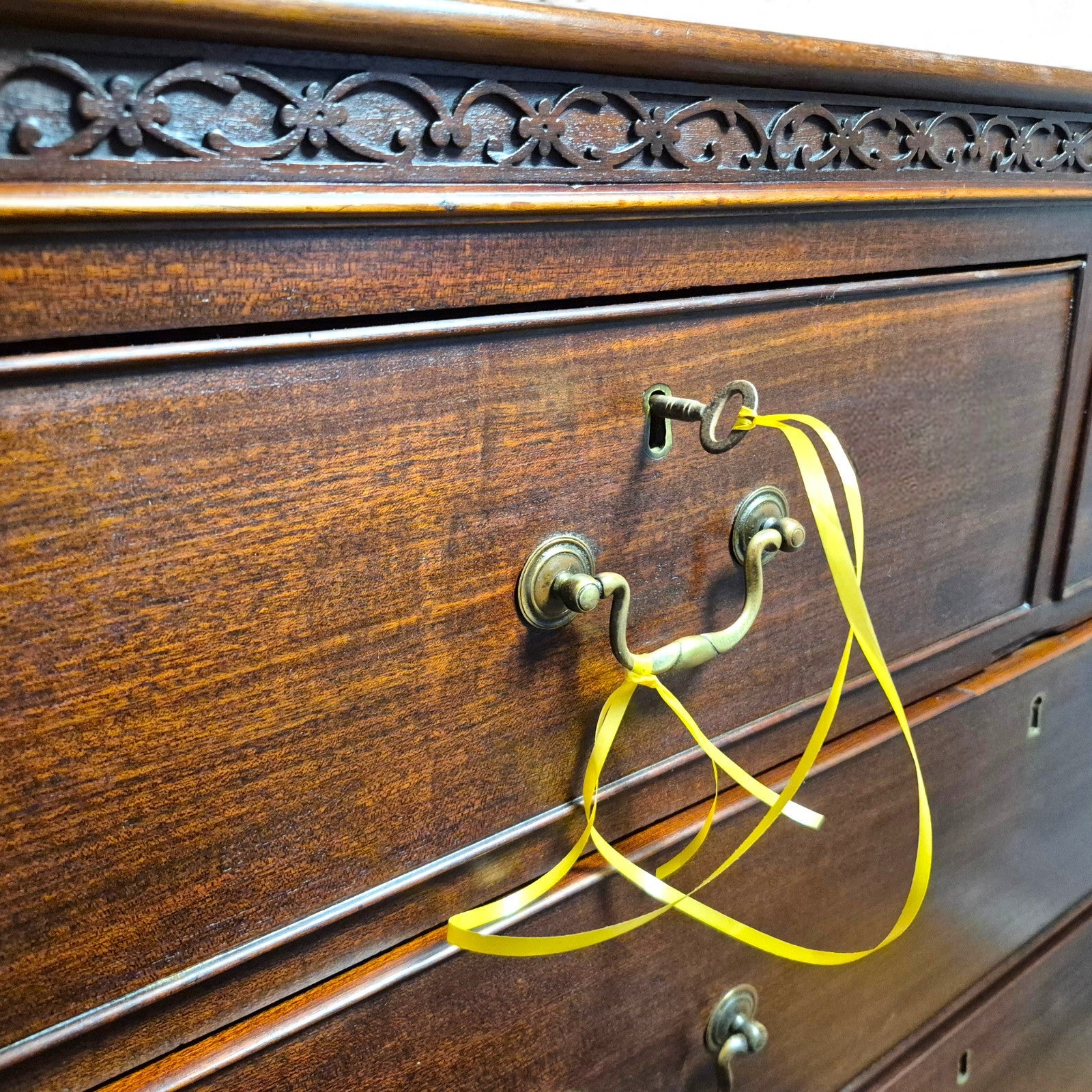 Victorian Mahogany tallboy – close-up of brass swan-neck handles and escutcheons