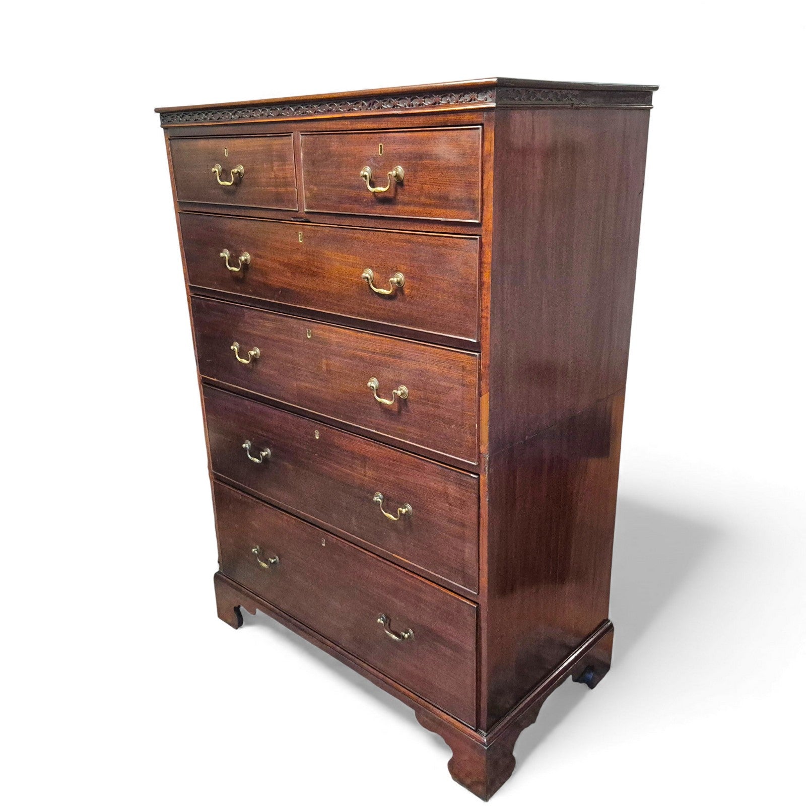 Antique mahogany chest of drawers – side profile showing bracket feet and moulded edges