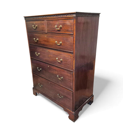 Antique mahogany chest of drawers – side profile showing bracket feet and moulded edges