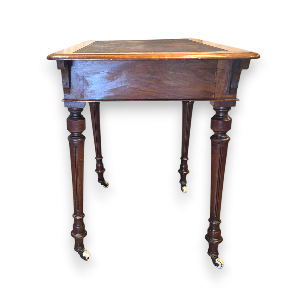Side view of antique Victorian walnut writing table