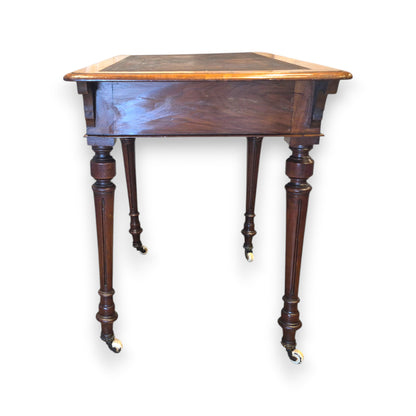 Side view of antique Victorian walnut writing table