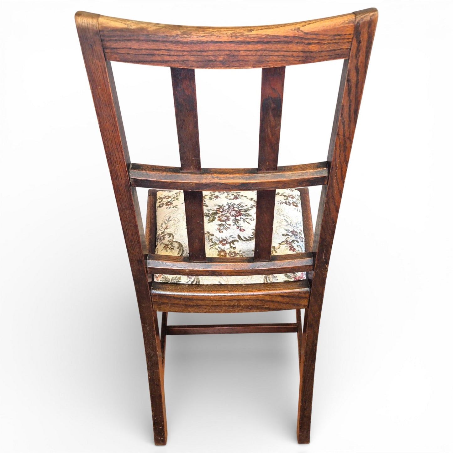 Detail of rear of square design back on oak dining chair