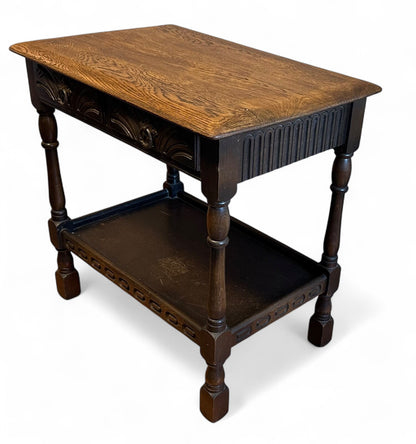 Elm side table showing grain pattern and turned legs