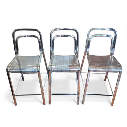 Modernist perforated metal bar stool design