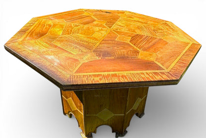 Danish mid-century walnut dining table showing octagonal shape and marble inlay