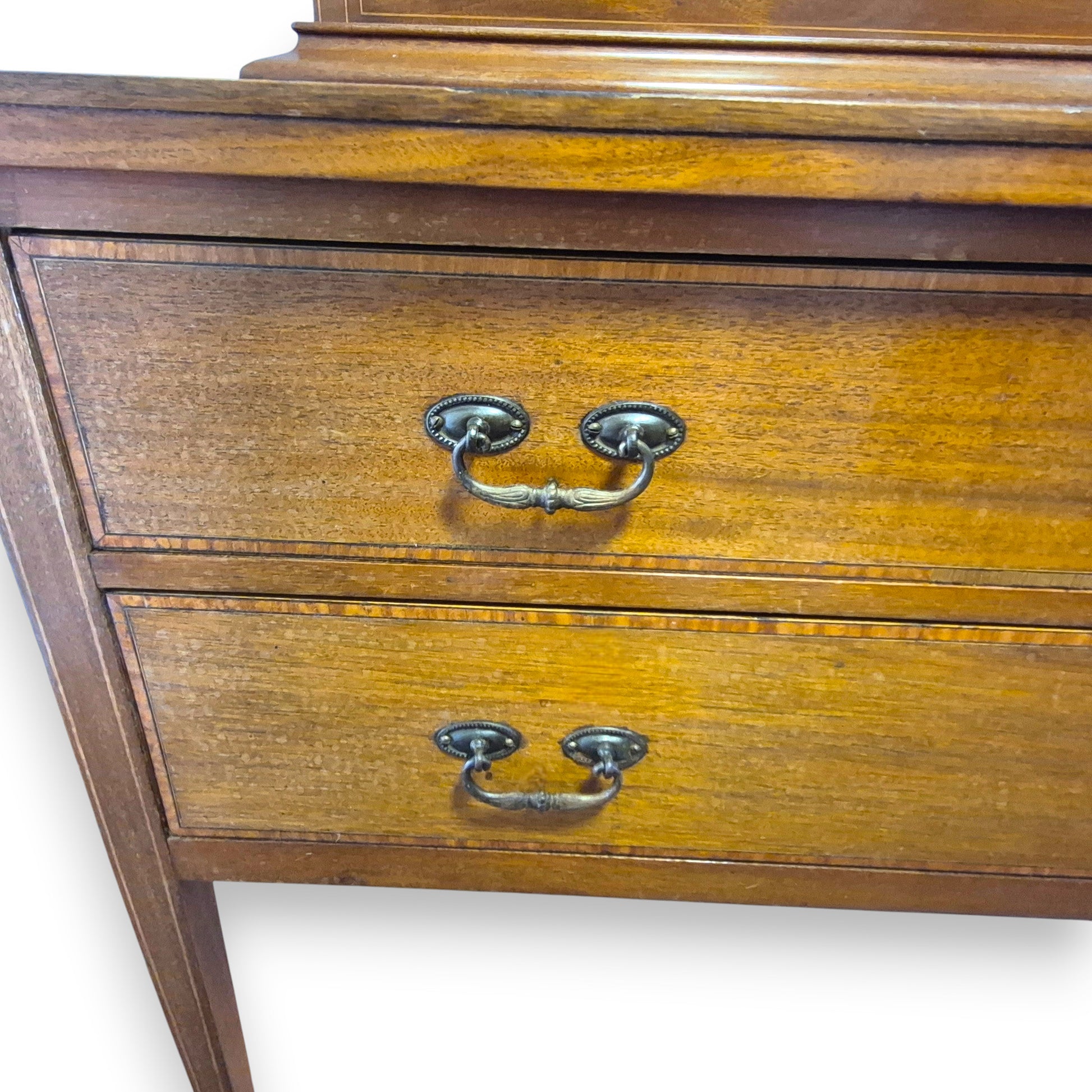 Mahogany veneer dressing table showing drawer handle detail